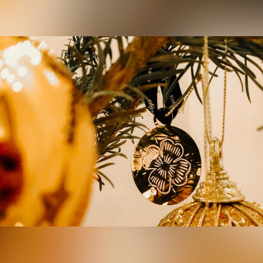 Three Diptyque Holiday Ornaments